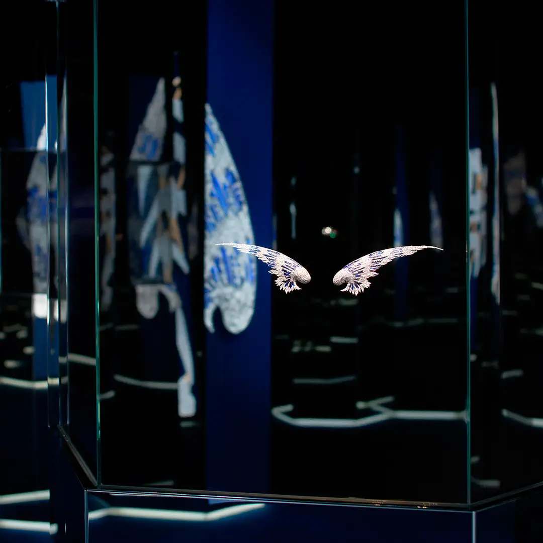 Chaumet diamond wing jewellery suspended in the exhibition