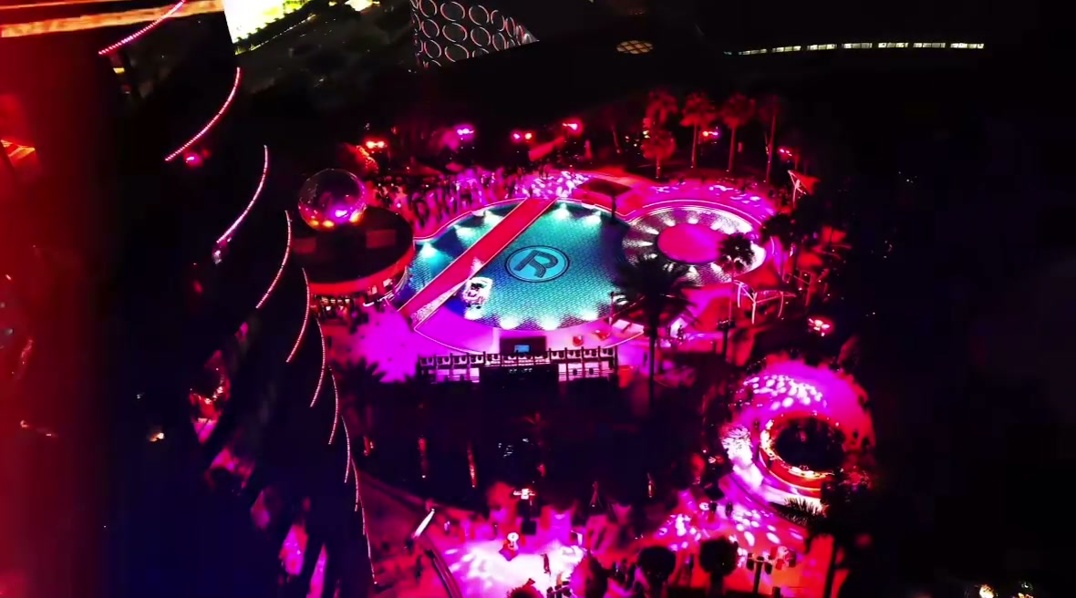 Opening-night aerial view of the realised pool party