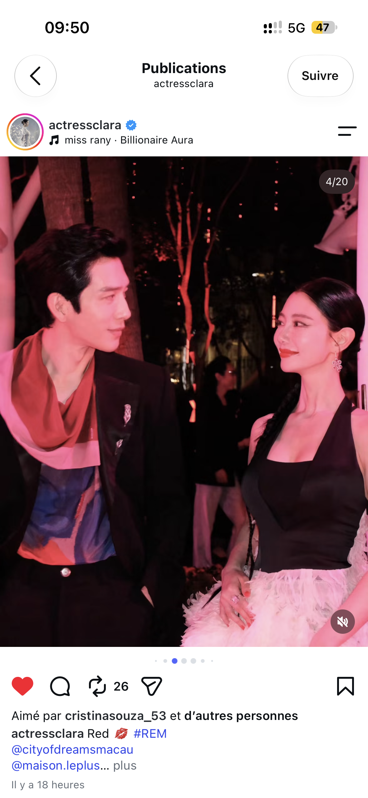 Two guests in evening wear sharing a moment at the party